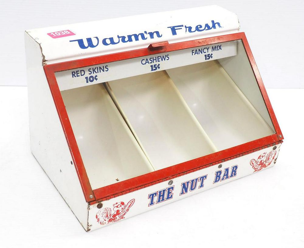 Lot 1038: Warm Fresh The Nut Bar metal nut cabinet