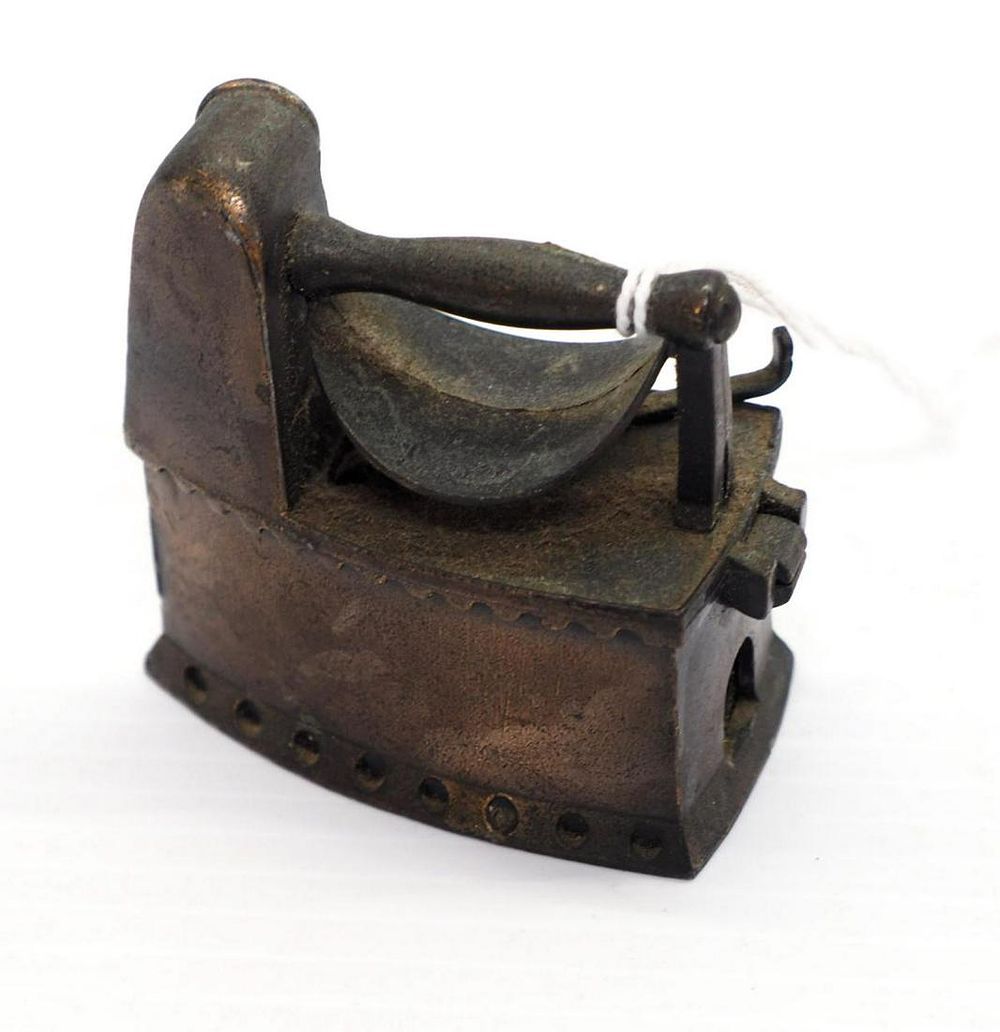 Lot 1051: Iron-shaped pencil sharpener