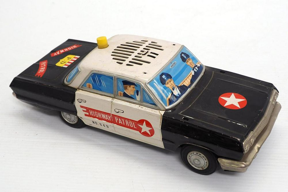 Lot 1064: Battery-operated Highway Patrol car toy