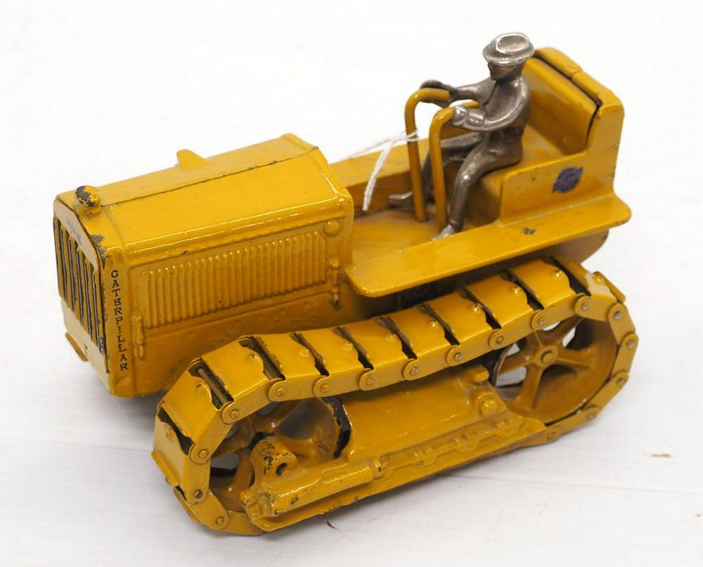 Lot 1071: Cast iron Arcade Caterpillar diesel toy crawler