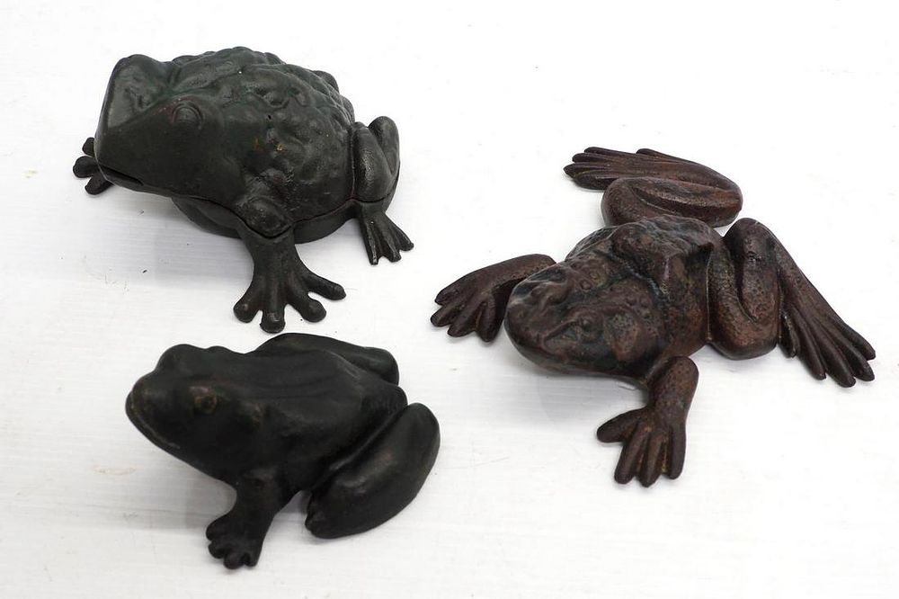 Lot 1095: (3) Cast iron frogs