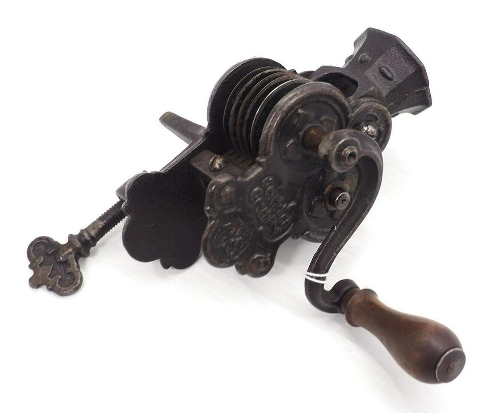 Lot 1098: Cast iron table mount bean cutter