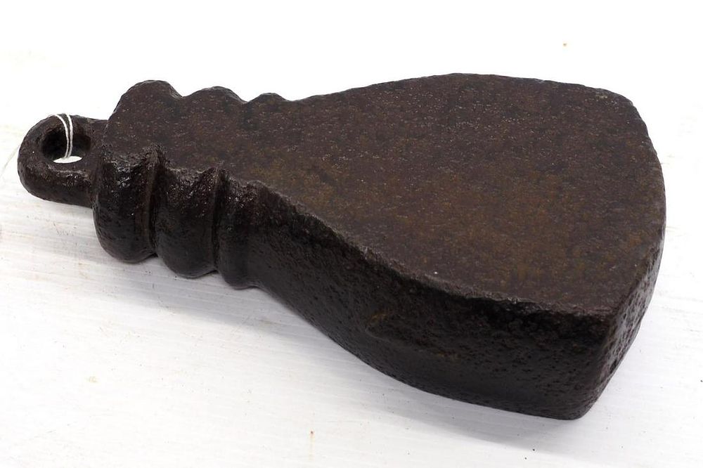 Lot 1179: Cast iron bell-shaped horse tie