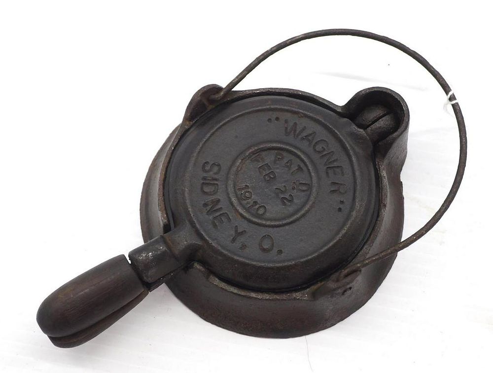 Lot 1180: Wagner child's cast iron waffle iron