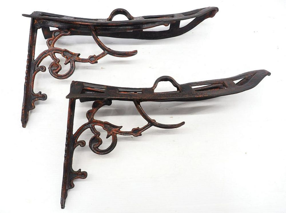 Lot 1218: (2) Cast iron harness hangers