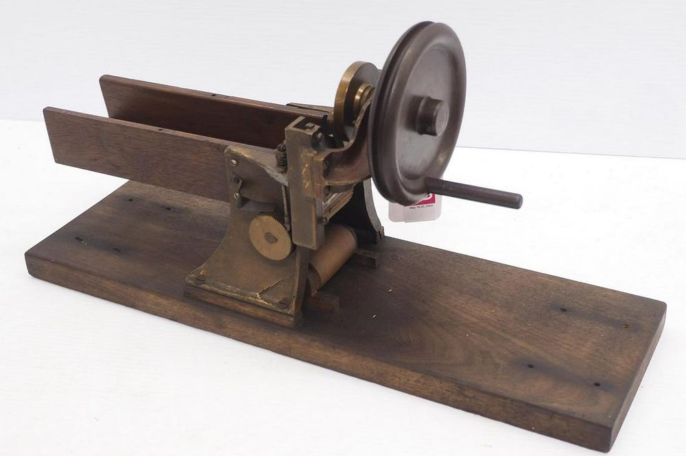 Lot 1219: Hand-crank wood & brass tobacco or pasta cutter