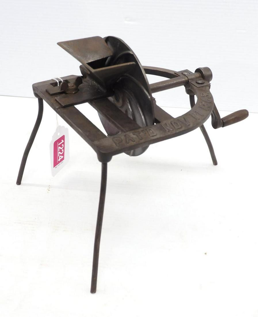 Lot 1224: Cast iron cherry pitter