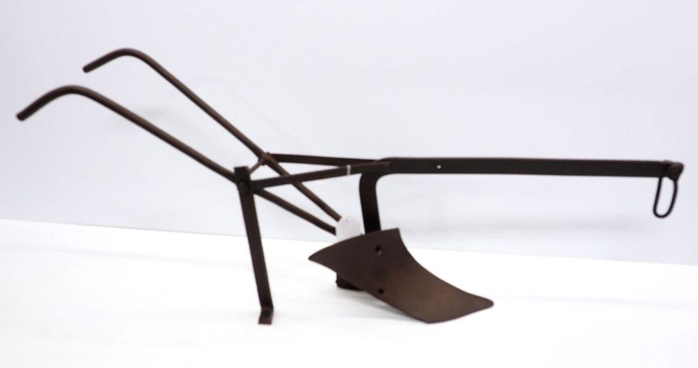 Lot 1233: Iron store display walk-behind plow
