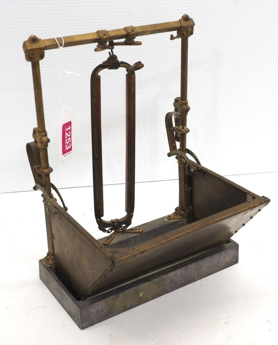 Lot 1253: Brass salesman sample Jamesway cow stanchion