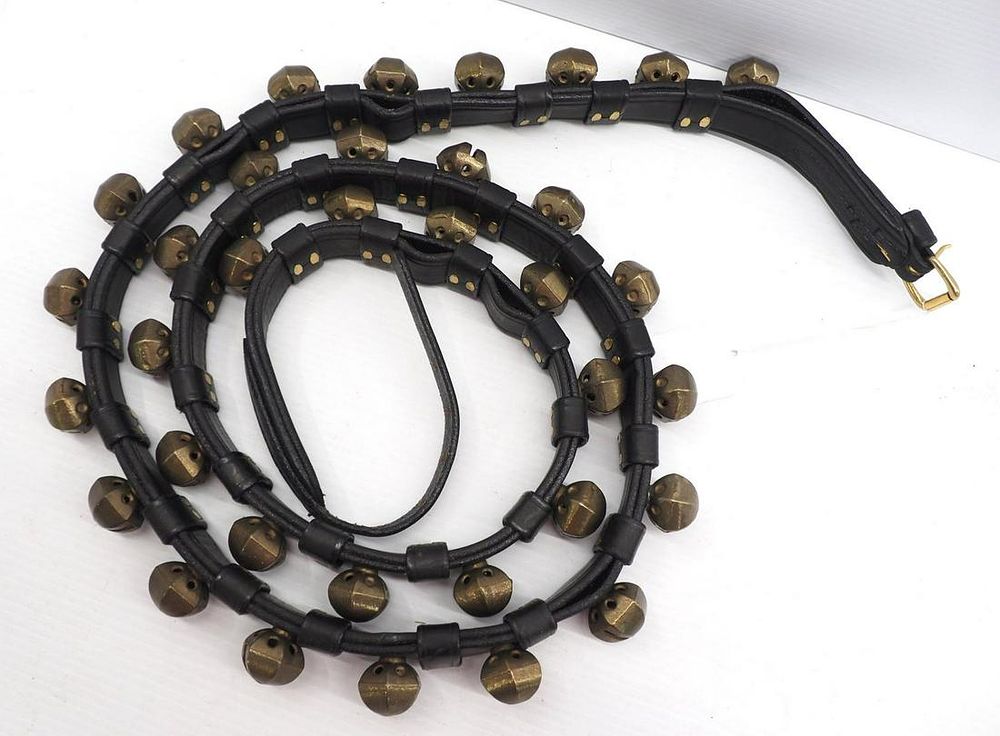 Lot 1257: Leather strap with 35 brass sleigh bells