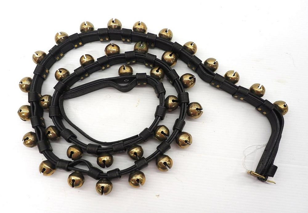 Lot 1258: Leather strap with 36 brass sleigh bells