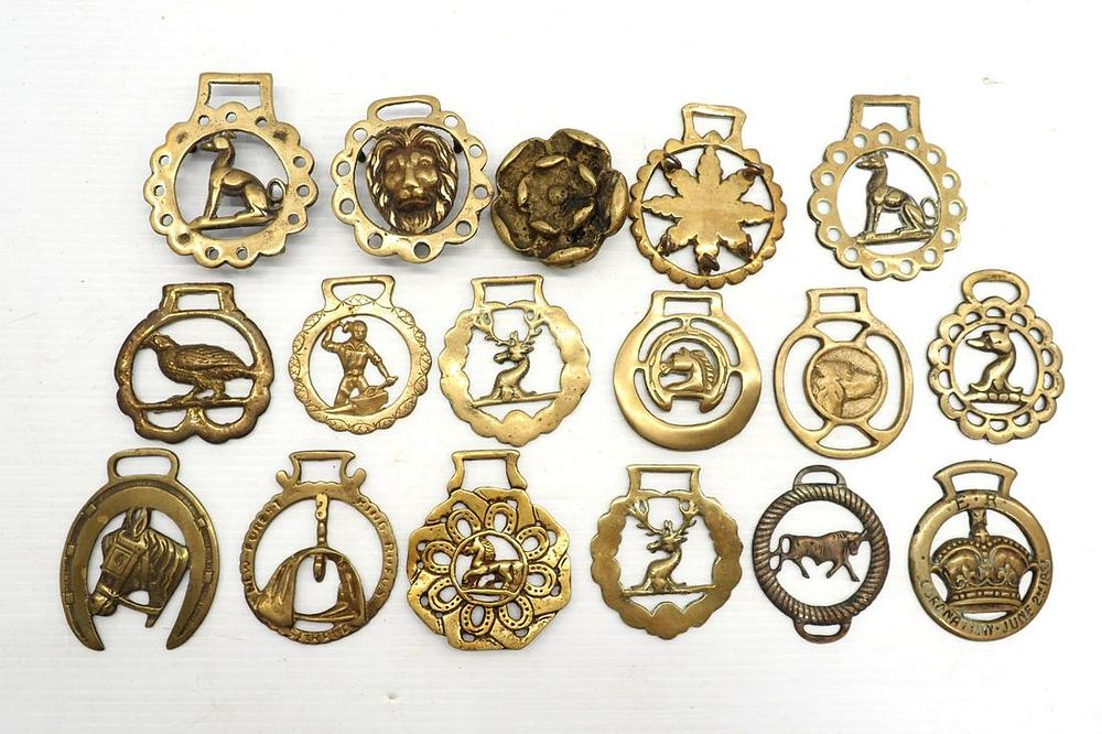 Lot 1313: Box lot of brass harness ornaments