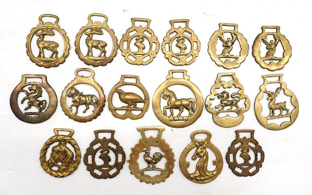 Lot 1314: Box lot of brass harness ornaments