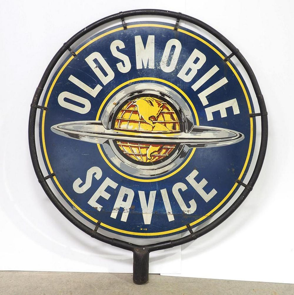 Lot 1324: Oldsmobile Service sign with cast iron frame