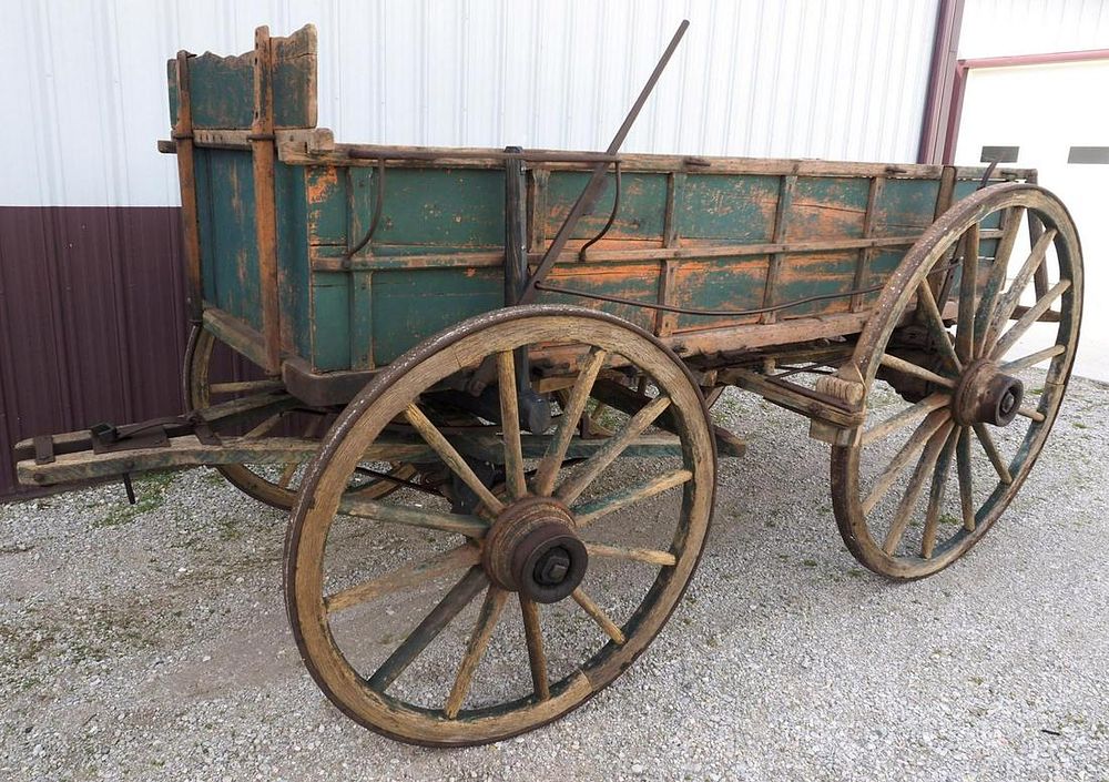 Lot 1329: Early wooden horse drawn freight wagon