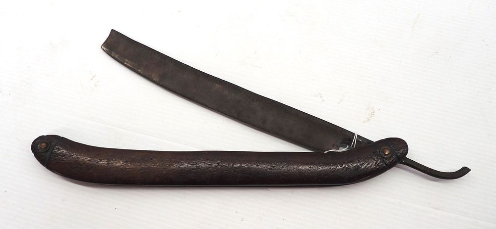 Lot 1341: Oversized straight shaver, store display?
