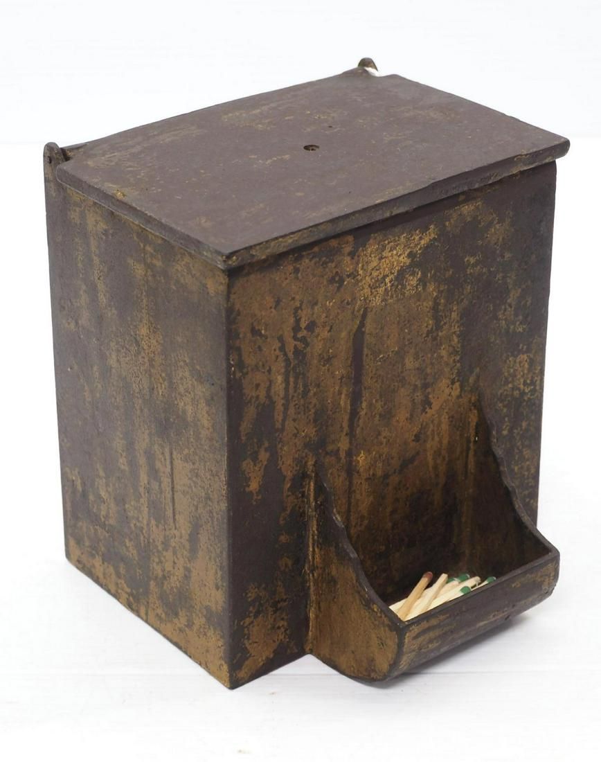 Lot 1378: Cast iron cigar box with match holder