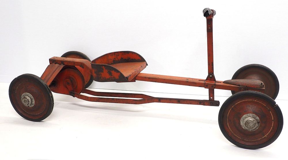 Lot 1385: Child's metal push and go cart