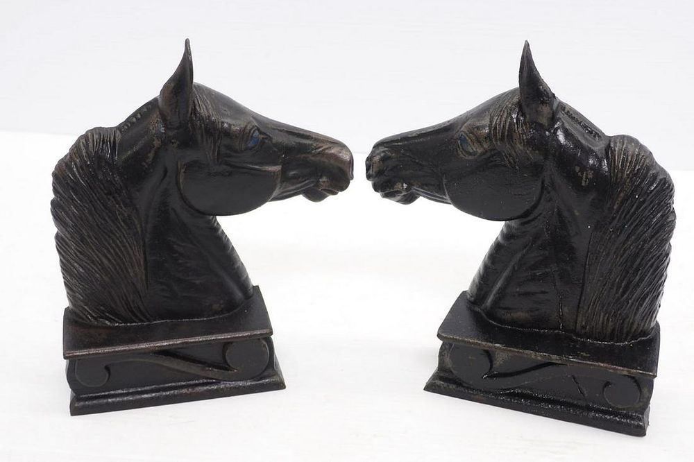 Lot 1387: Cast iron horse head book ends