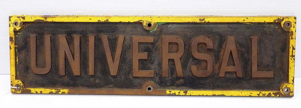 Lot 1388: Cast iron Universal sign