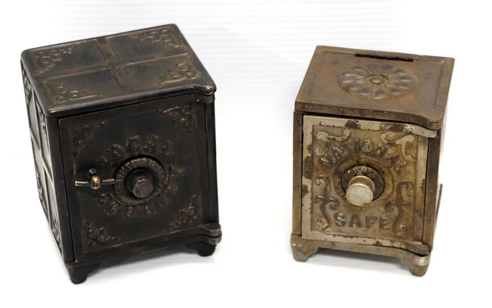 Lot 1396: (2) Cast iron safe banks