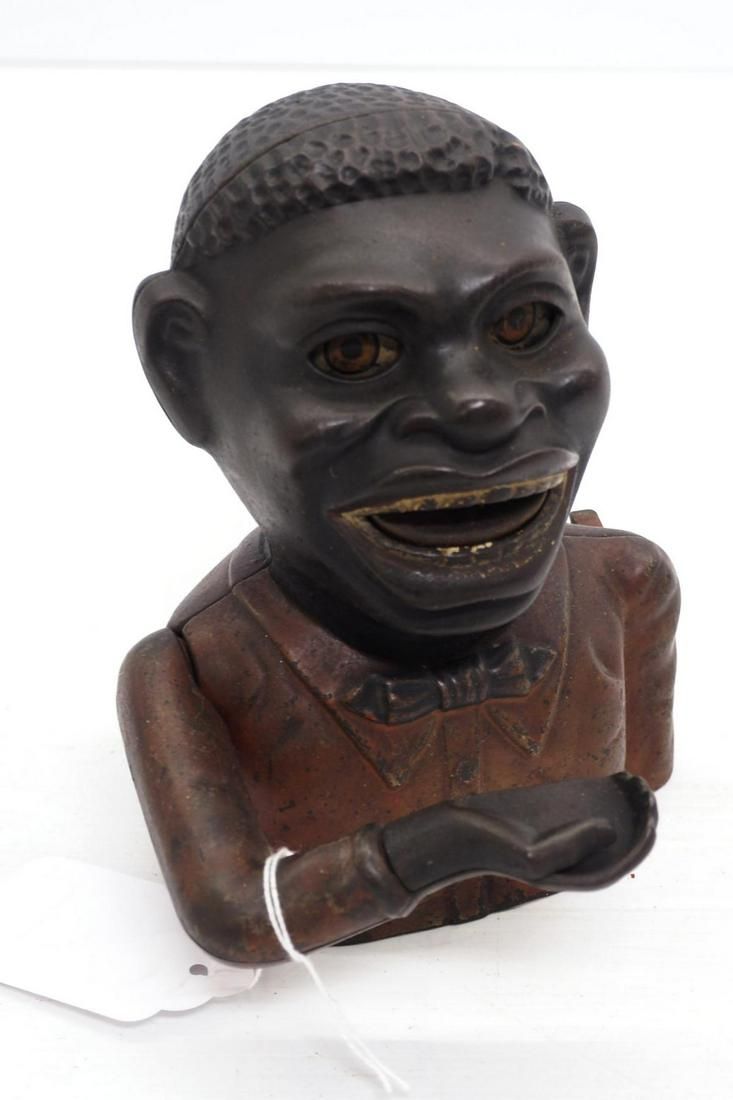 Lot 1407: Cast iron The Jolly N***** mechanical bank