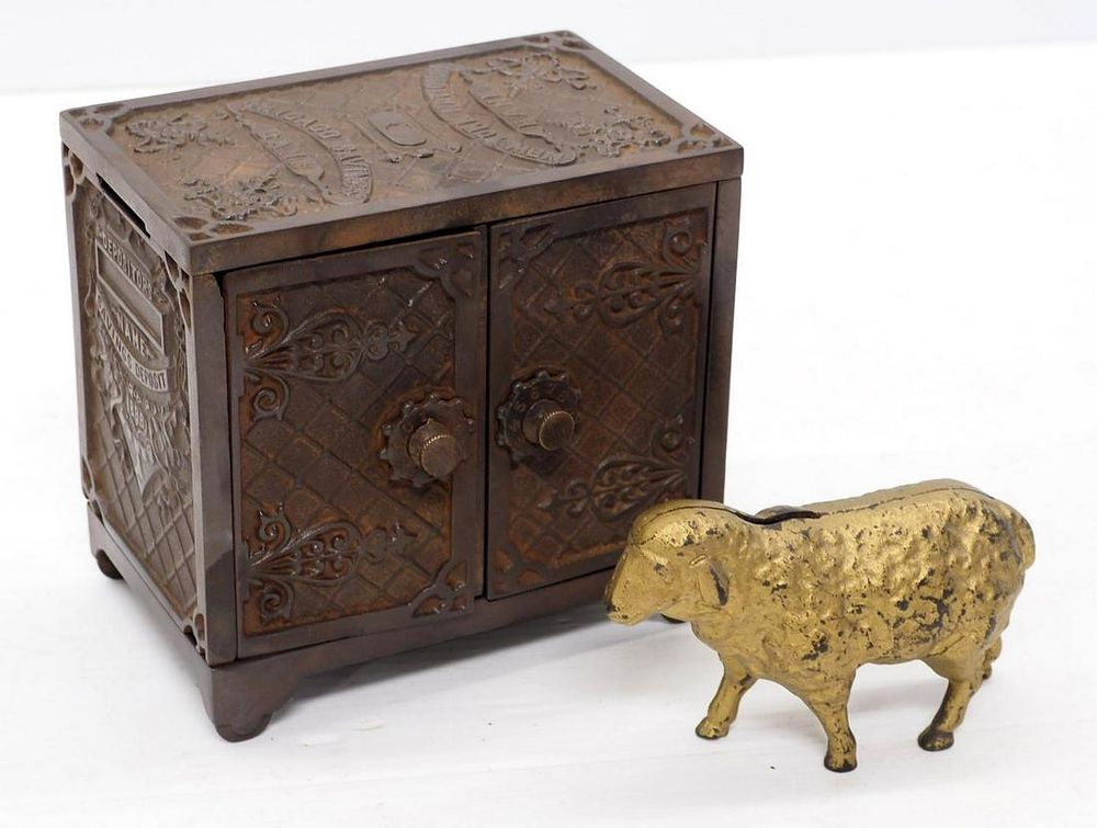 Lot 1415: (2) Cast iron banks
