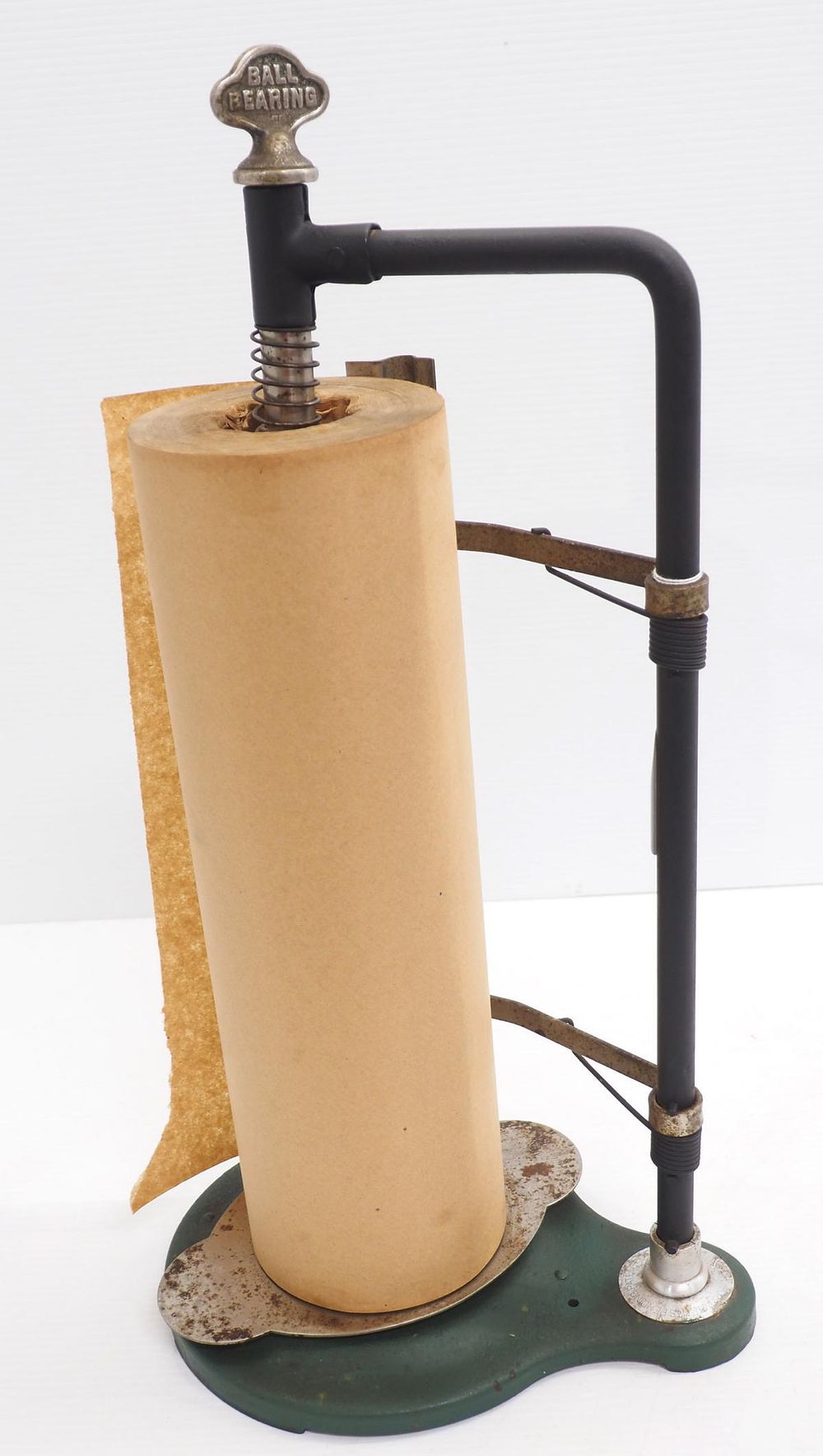 Lot 1450: Ball-bearing country store paper dispenser