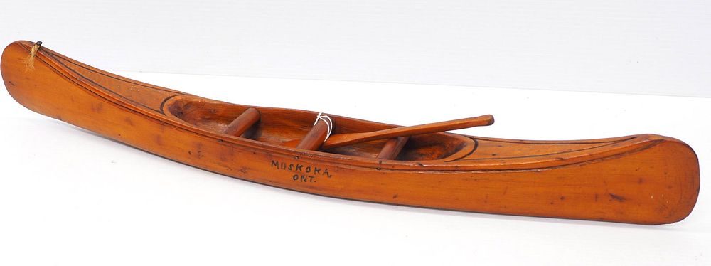 Lot 1461: Miniature wooden canoe, Ontario Canada