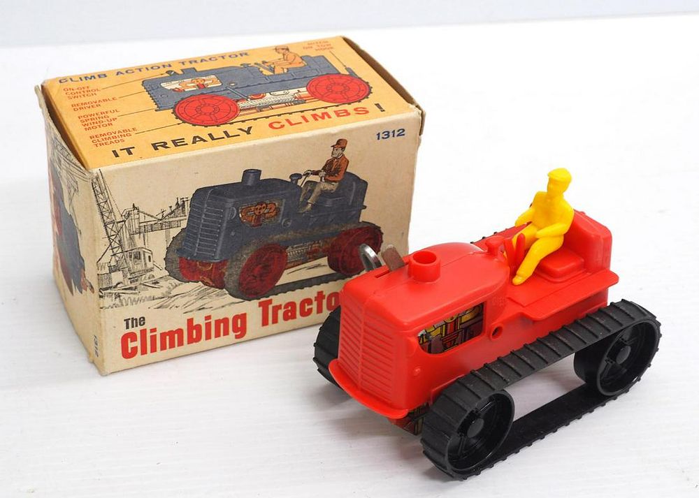 Lot 1466: Marx climbing wind-up tractor