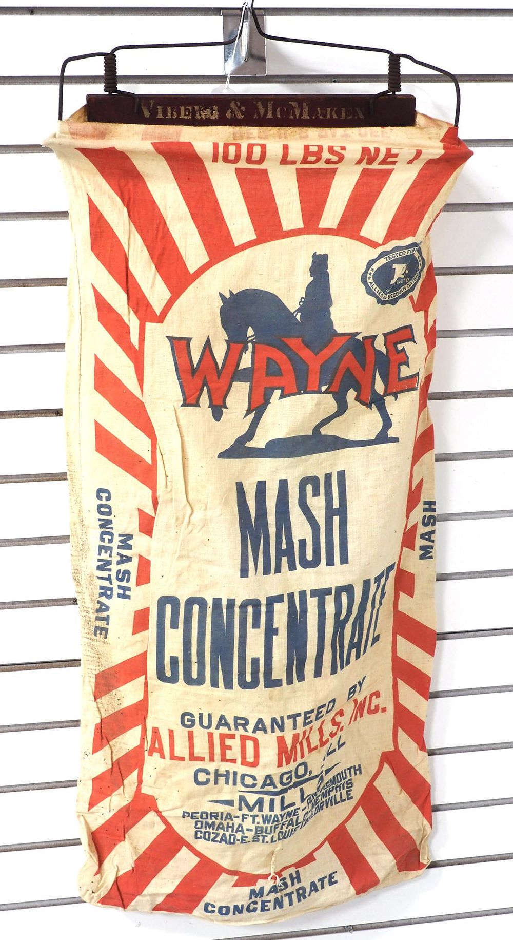Lot 1477: Bag holder with Wayne Mash feed bag