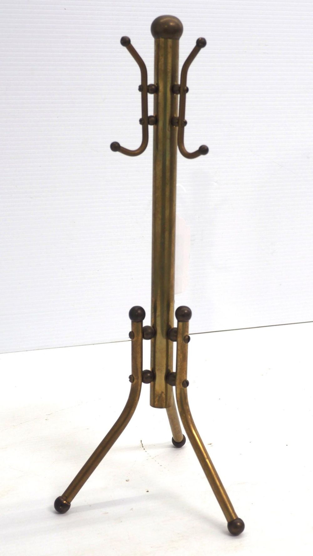 Lot 57: Salesman brass hall tree