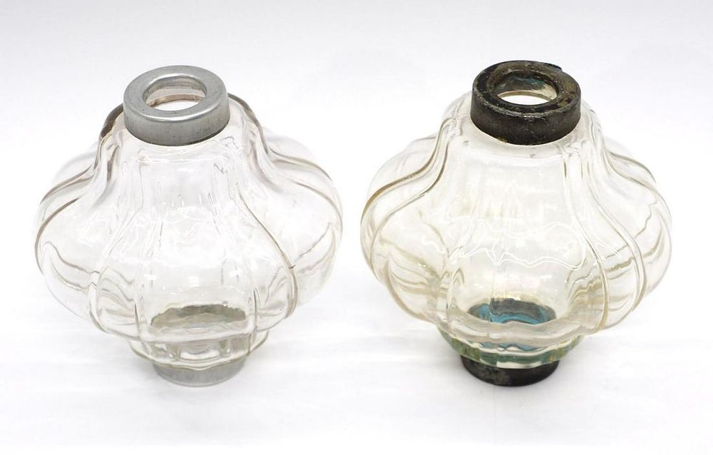 Lot 105: (2) Chestnut clear lightning rod balls