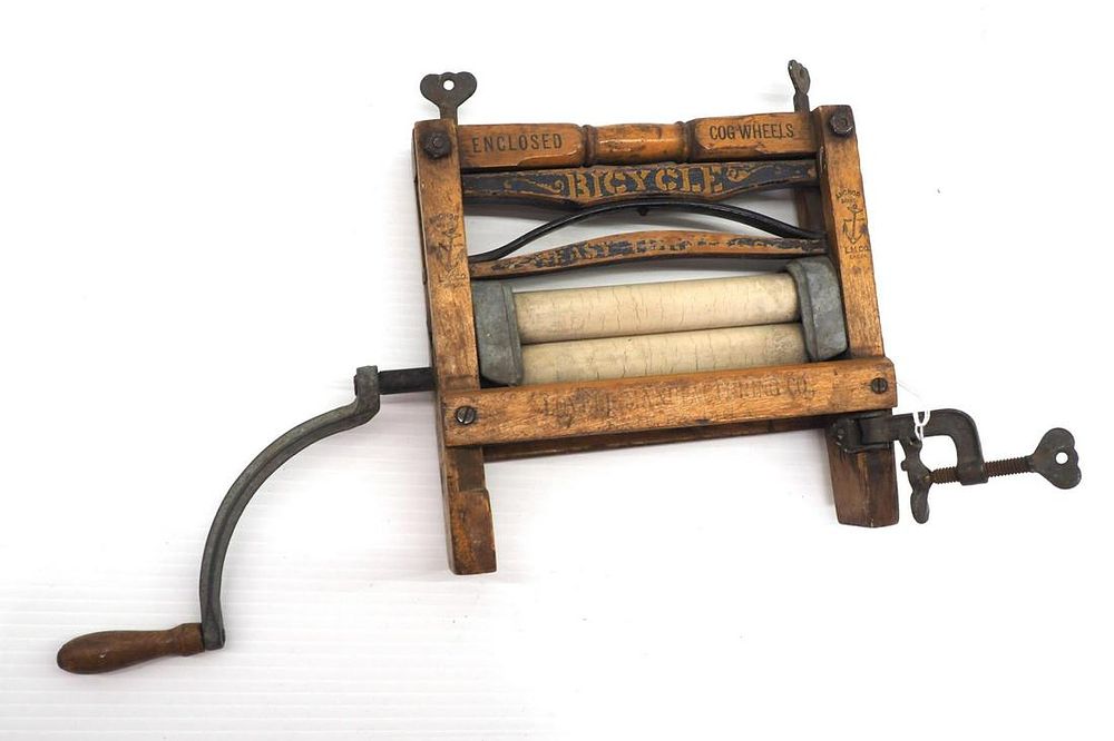 Lot 120: Child-size Bicycle hand-crank clothes wringer