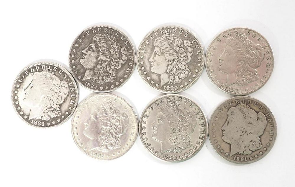 Lot 143: (7) Morgan Silver Dollars from 1880 to 1921