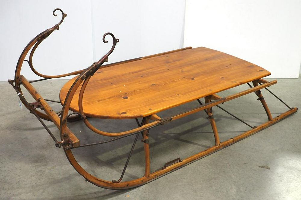 Lot 198: Sleigh-shaped coffee table