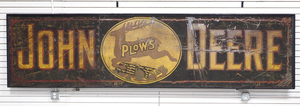 Lot 250: Early 3-legged John Deere Plows sign