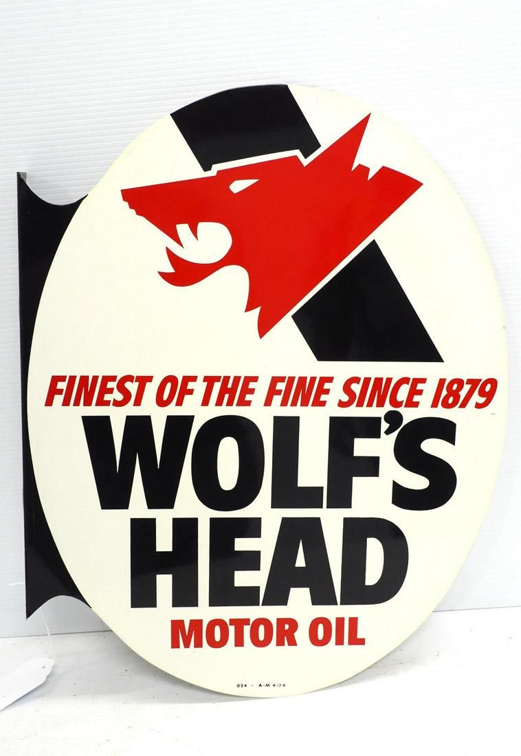 Lot 270: Flanged Wolf's Head Motor Oil sign