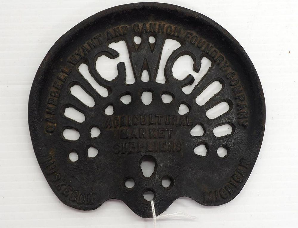 Lot 275: Cast iron CWC cut-out collectors seat