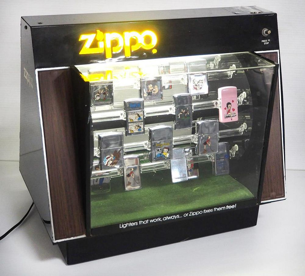 Lot 313: Vintage light-up Zippo case