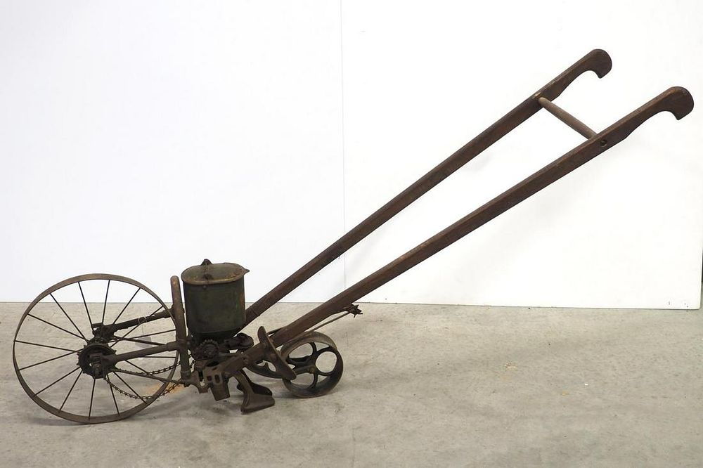 Lot 331: Iron Age walk-behind planter