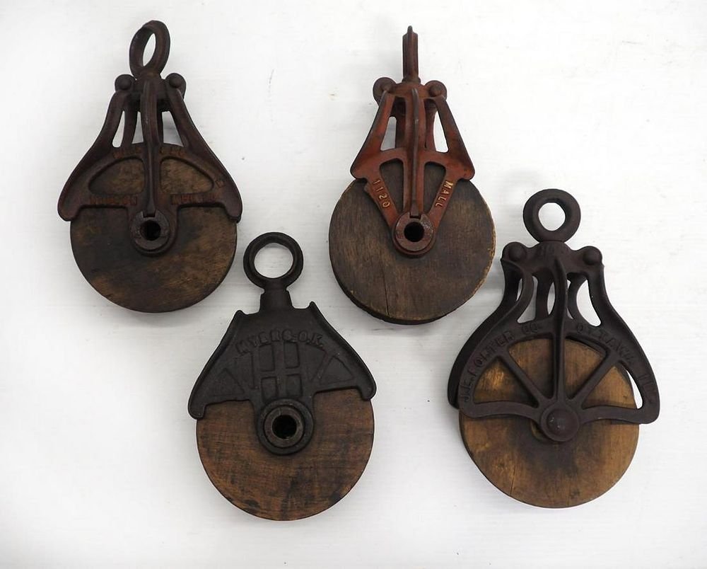 Lot 547: (4) Wooden wheel pulleys