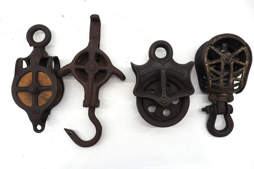 Lot 548: (4) Pulleys