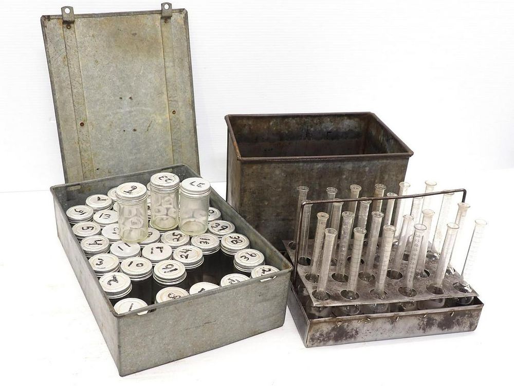 Lot 557: (2) Galvanized boxes with milk testing tubes