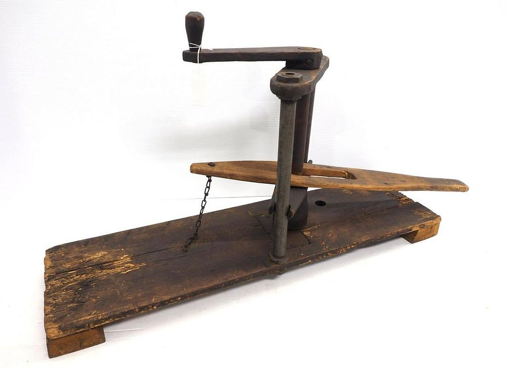 Lot 560: Primitive hand-crank slaw cutter