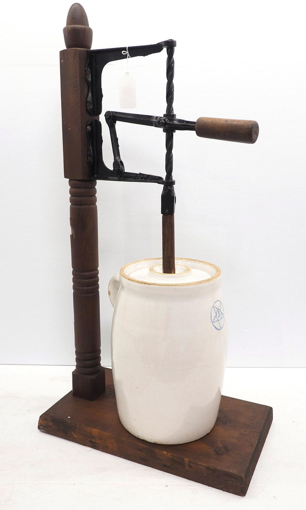Lot 563: Hand-operated floor model butter churn with crock