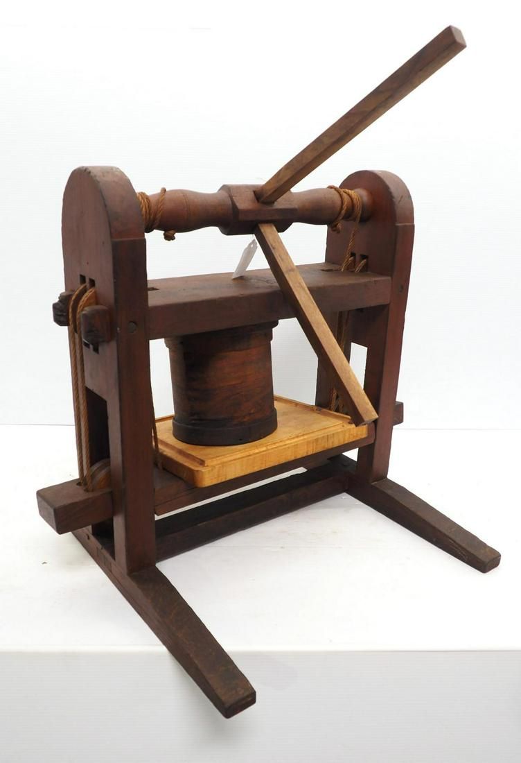 Lot 564: Primitive cheese press with two newer handles