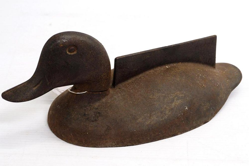 Lot 582: Cast iron duck boot scraper
