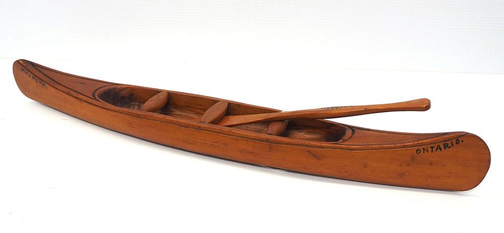 Lot 583: Miniature wooden canoe, Ontario Canada