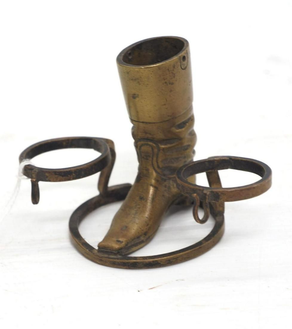 Lot 598: Brass boot match holder